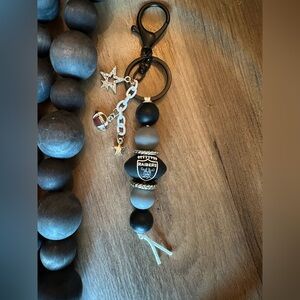NFL Football Game Day LV RAIDERS
Tote Purse Beaded Bag Charm Black Gray 6"